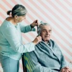 elderly lifestyle. Woman taking care of an old man